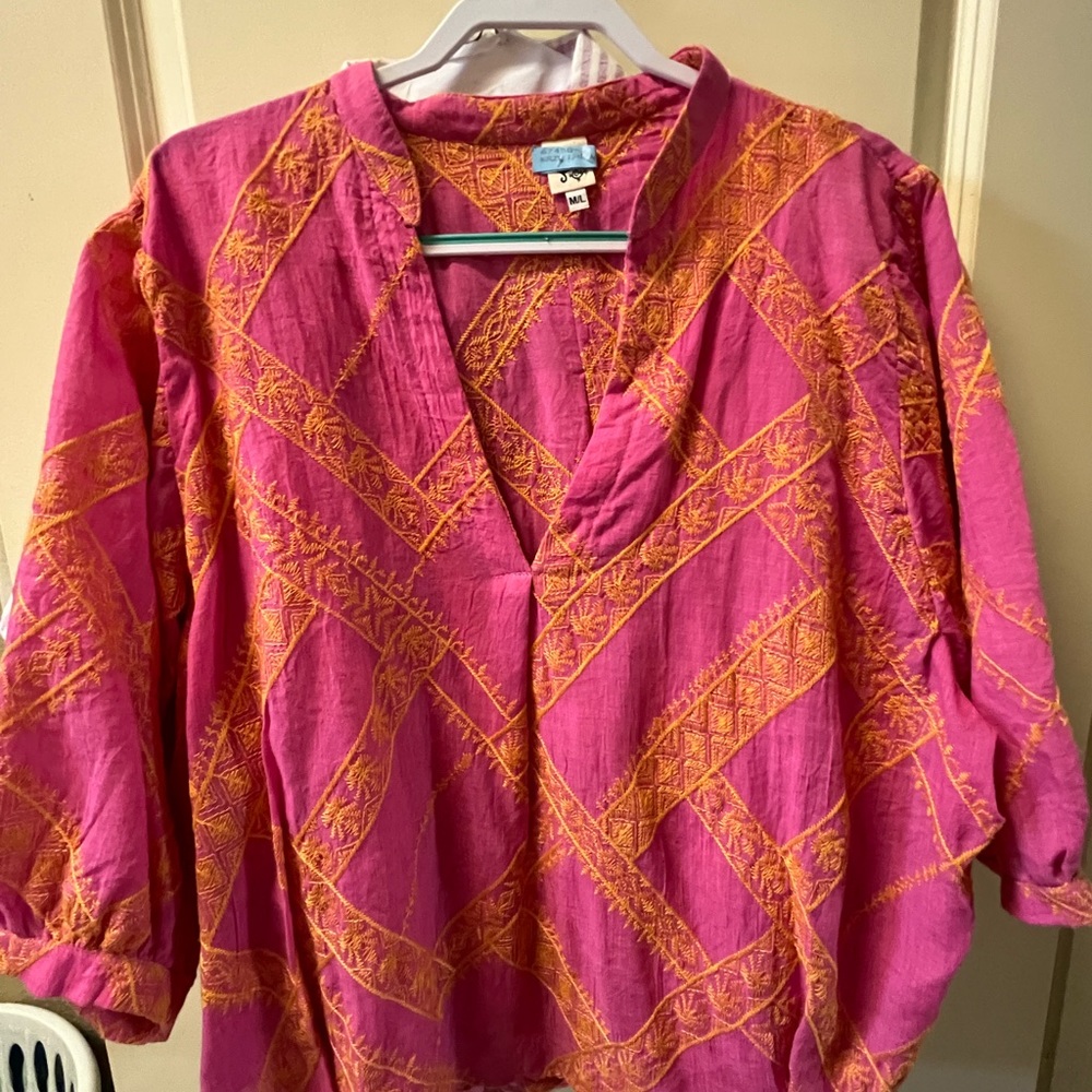 Beautiful vibrant pink blouse w/ orange embroidery. Fits more like an ***XL***.